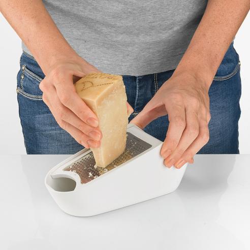 Guzzini - Grattugia Manuale con Contenitore Grate&Store
